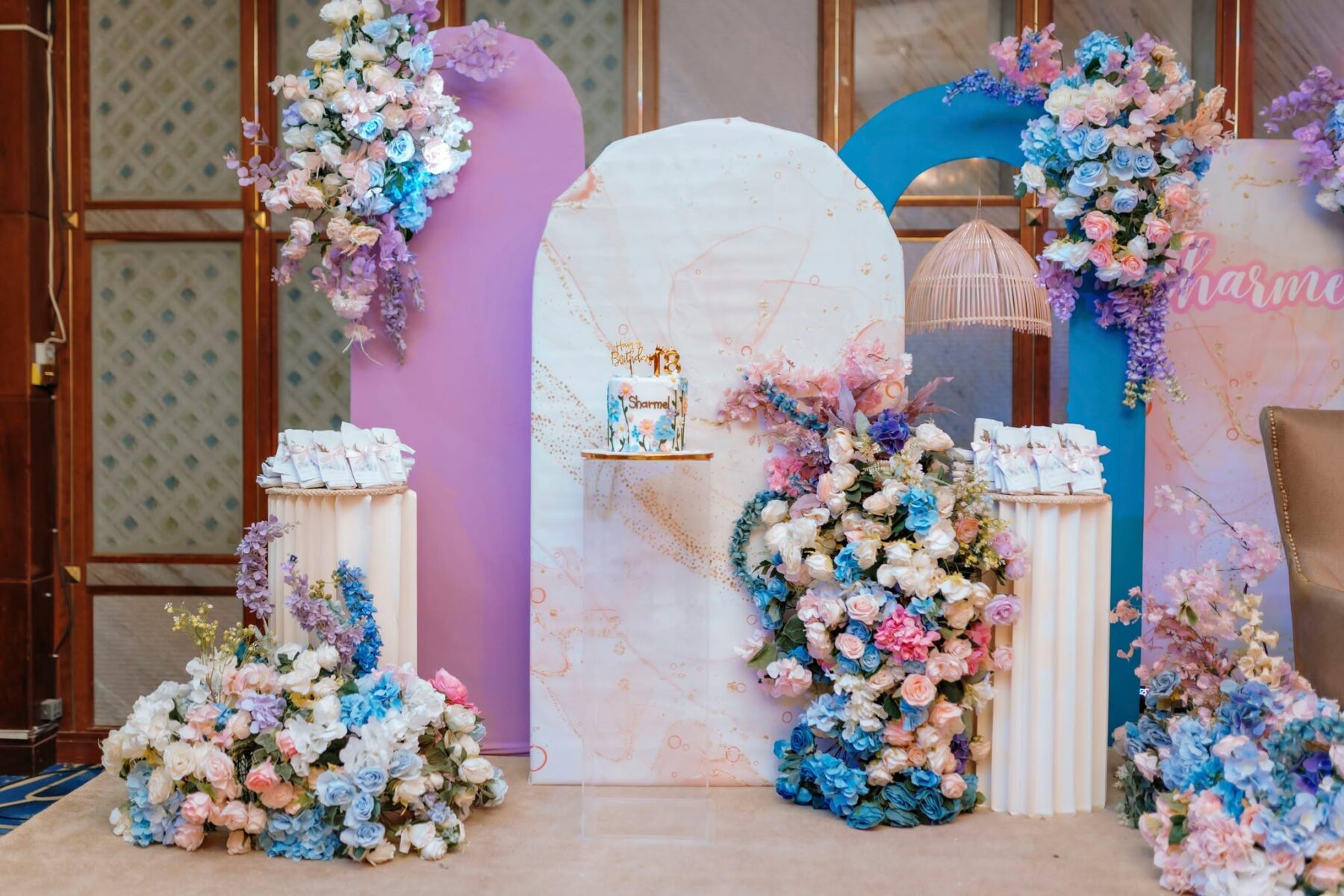 Custom event backdrop design for a celebration in Abu Dhabi